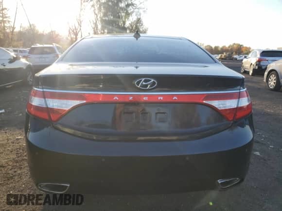 2013 Hyundai Azera с VIN KMHFH4JG7DA277438, выставлен на аукционе Copart как лот 82655115 с пробегом 187 449 миль миль и Чистый • Clean title. История ставок и продаж доступна на DreamBid. Изображение 6.