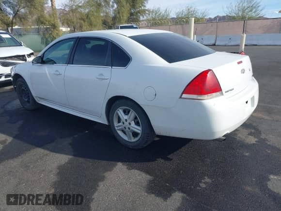 2012 Chevrolet Impala Police Police with VIN 2G1WD5E38C1288463, listed as a IAAI auction lot 41254050 with 195,512 mi miles and . Bid and sale history available at DreamBid. Image 3.