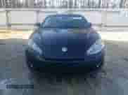 2008 Hyundai Tiburon GS with VIN KMHHM66D08U292138, listed as a Copart auction lot 83320704 with 277,189 mi miles and Salvage title. Bid and sale history available at DreamBid. Image 5.