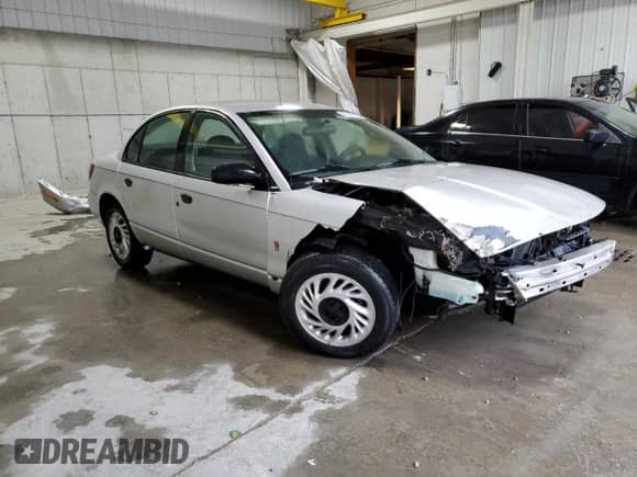 2002 Saturn SL с VIN 1G8ZH52842Z174081, выставлен на аукционе Copart как лот 82309115 с пробегом 197 180 миль миль и Списание • Salvage title. История ставок и продаж доступна на DreamBid. Изображение 4.