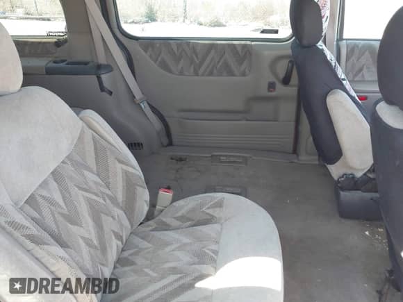 1999 Chevrolet Venture z VIN 1GNDX03E8XD189639, wystawiony jako IAAI lot #41654509 z przebiegiem 214 318 mil mil oraz . Historia ofert i sprzedaży dostępna na DreamBid. Obrazek 8.