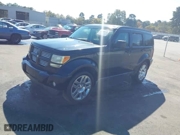 2011 Dodge Nitro Heat with VIN 1D4PT4GK2BW605581, listed as a IAAI auction lot 43489168 with 138,049 mi miles and . Bid and sale history available at DreamBid. Image 2.