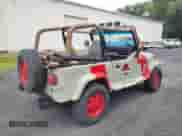 1989 Jeep Wrangler with VIN 2J4FY29TXKJ157595, listed as a Copart auction lot 64847645 with 156,475 mi miles and Clean title. Bid and sale history available at DreamBid. Image 4.