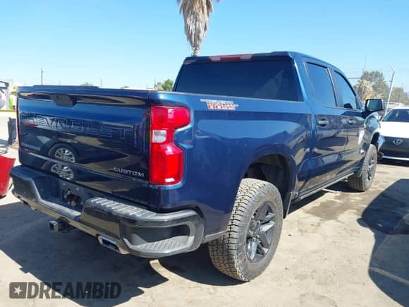 2021 Chevrolet Silverado 1500 Custom Trail Boss with VIN 1GCPYCEF4MZ234391, listed as a IAAI auction lot 42677448 with 87,228 mi miles and . Bid and sale history available at DreamBid. Image 4.