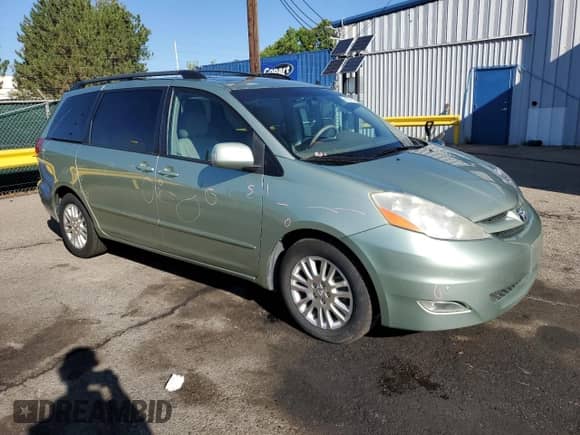 2010 Toyota Sienna XLE с VIN 5TDYK4CCXAS303876, выставлен на аукционе Copart как лот 81272115 с пробегом 170 141 миль миль и Списание • Salvage title. История ставок и продаж доступна на DreamBid. Изображение 4.