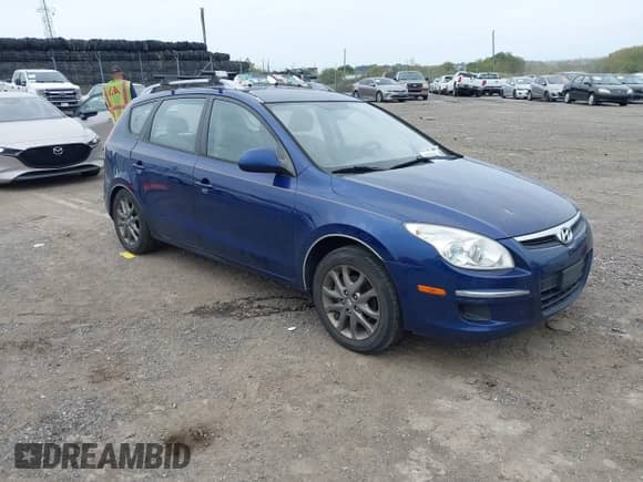 2012 Hyundai Elantra SE z VIN KMHDC8AE7CU158412, wystawiony jako IAAI lot #43272541 z przebiegiem 142 571 mil mil oraz . Historia ofert i sprzedaży dostępna na DreamBid. Obrazek 1.