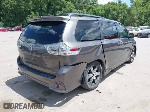 2014 Toyota Sienna SE with VIN 5TDXK3DC8ES443113, listed as a IAAI auction lot 42735795 with 235,269 mi miles and . Bid and sale history available at DreamBid. Image 4.