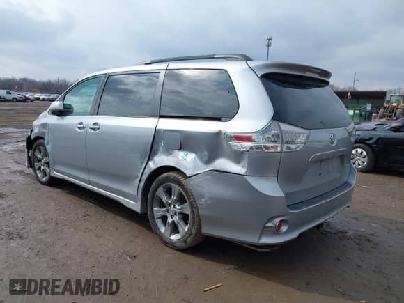 2011 Toyota Sienna SE with VIN 5TDXK3DC1BS096963, listed as a IAAI auction lot 41676328 with 168,436 mi miles and . Bid and sale history available at DreamBid. Image 3.