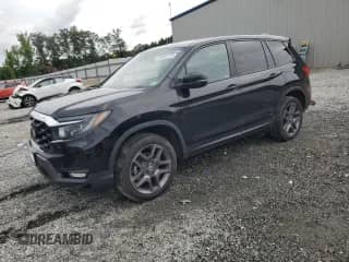 2022 Honda Passport EX-L with VIN 5FNYF8H56NB018477, listed as a Copart auction lot 68481775 with 67,175 mi miles and Clean title. Bid and sale history available at DreamBid. Image 1.