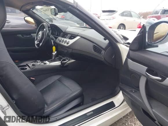 2013 BMW Z4 sDrive28i with VIN WBALL5C5XDJ104436, listed as a IAAI auction lot 41742648 with 112,309 mi miles and . Bid and sale history available at DreamBid. Image 5.