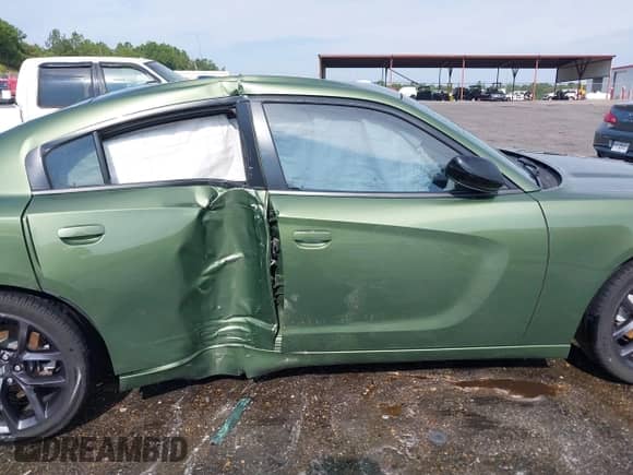 2021 Dodge Charger SXT with VIN 2C3CDXBG8MH657042, listed as a IAAI auction lot 42858029 with 88,607 mi miles and . Bid and sale history available at DreamBid. Image 13.