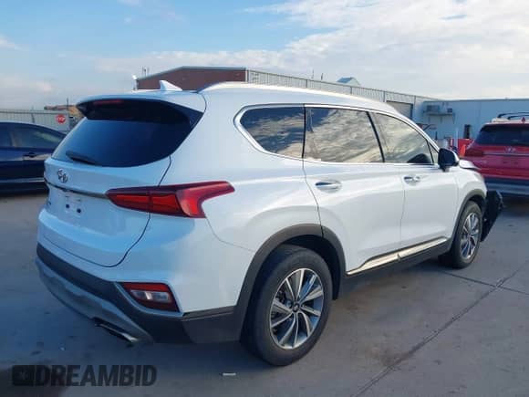 2020 Hyundai Santa Fe Limited with VIN 5NMS53AD5LH201202, listed as a IAAI auction lot 43340784 with 83,597 mi miles and . Bid and sale history available at DreamBid. Image 4.