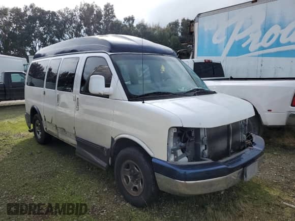 2004 Chevrolet Express Passenger with VIN 1GBFG15T141228284, listed as a Copart auction lot 86305194 with Not provided miles and Salvage title. Bid and sale history available at DreamBid. Image 4.