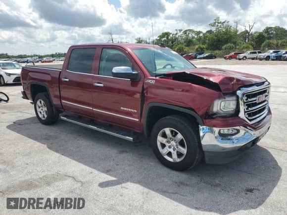 2017 GMC Sierra 1500 SLT with VIN 3GTU2NEC1HG378962, listed as a Copart auction lot 70701025 with 163,364 mi miles and Salvage title. Bid and sale history available at DreamBid. Image 4.