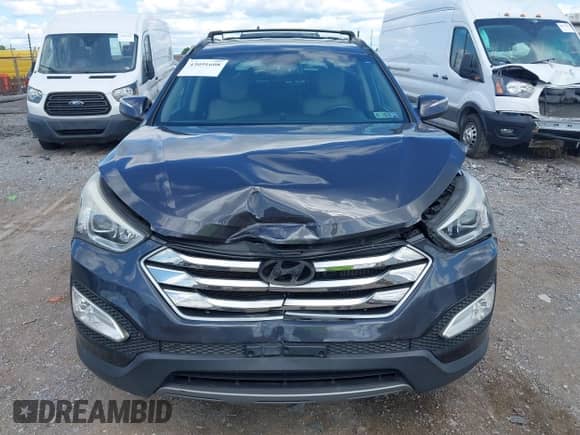 2015 Hyundai Santa Fe z VIN 5XYZUDLA3FG304904, wystawiony jako IAAI lot #43091608 z przebiegiem 76 000 mil mil oraz . Historia ofert i sprzedaży dostępna na DreamBid. Obrazek 12.
