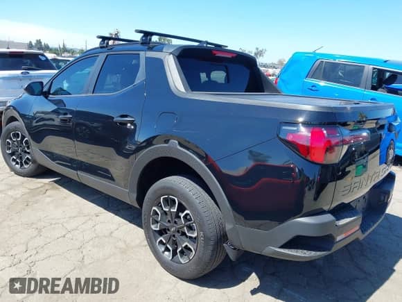 2022 Hyundai Santa Cruz SEL z VIN 5NTJCDAE4NH022754, wystawiony jako IAAI lot #42807649 z przebiegiem 32 816 mil mil oraz . Historia ofert i sprzedaży dostępna na DreamBid. Obrazek 3.