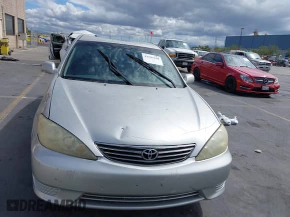 2006 Toyota Camry STD z VIN 4T1BE32K16U156037, wystawiony jako IAAI lot #43193359 z przebiegiem 187 400 mil mil oraz . Historia ofert i sprzedaży dostępna na DreamBid. Obrazek 12.