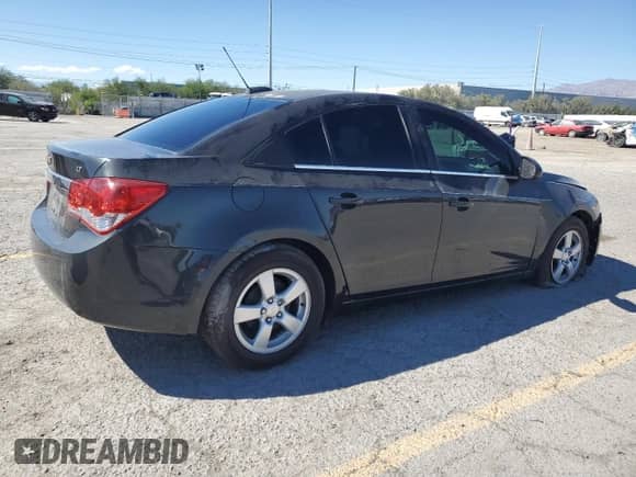 2015 Chevrolet Cruze LT with VIN 1G1PC5SB9F7200787, listed as a Copart auction lot 83979695 with 116,710 mi miles and Salvage title. Bid and sale history available at DreamBid. Image 3.