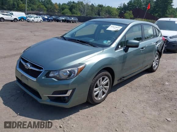 2015 Subaru Impreza Premium with VIN JF1GPAC67FH284002, listed as a IAAI auction lot 42929033 with 57,552 mi miles and . Bid and sale history available at DreamBid. Image 2.