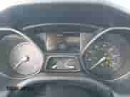 2014 Ford Focus Titanium z VIN 1FADP3N28EL112212, wystawiony jako IAAI lot #43448816 z przebiegiem 143 607 mil mil oraz . Historia ofert i sprzedaży dostępna na DreamBid. Obrazek 7.