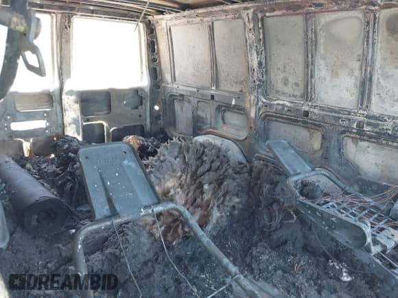 2005 Chevrolet Astro Cargo z VIN 1GCDM19X75B106839, wystawiony jako IAAI lot #42645770 z przebiegiem Nie podano mil oraz . Historia ofert i sprzedaży dostępna na DreamBid. Obrazek 8.