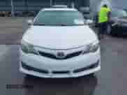 2014 Toyota Camry SE with VIN 4T1BF1FK4EU739728, listed as a IAAI auction lot 43381322 with 218,010 mi miles and . Bid and sale history available at DreamBid. Image 12.