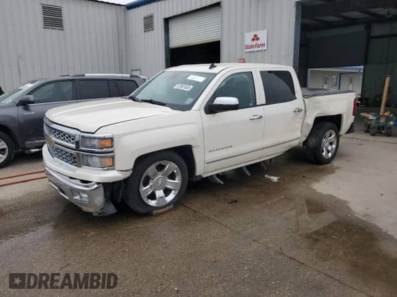 2014 Chevrolet Silverado 1500 LTZ with VIN 3GCPCSEC6EG534191, listed as a Copart auction lot 57961855 with 127,305 mi miles and Salvage title. Bid and sale history available at DreamBid. Image 1.