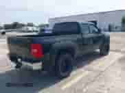 2009 Chevrolet Silverado 1500 LTZ with VIN 1GCEK39039Z297858, listed as a IAAI auction lot 42410265 with 217,423 mi miles and . Bid and sale history available at DreamBid. Image 4.