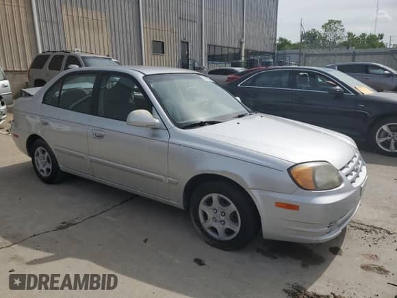 2004 Hyundai Accent GL z VIN KMHCG45C64U524377, wystawiony jako Copart lot #53976094 z przebiegiem 65 230 mil mil oraz Nie do naprawy • Non repairable. Historia ofert i sprzedaży dostępna na DreamBid. Obrazek 4.