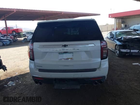 2021 Chevrolet Suburban High Country z VIN 1GNSCGKL3MR190496, wystawiony jako IAAI lot #39935508 z przebiegiem Nie podano mil oraz . Historia ofert i sprzedaży dostępna na DreamBid. Obrazek 15.