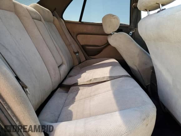 1995 Toyota Camry LE z VIN 4T1SK12E1SU572333, wystawiony jako Copart lot #80828565 z przebiegiem 151 689 mil mil oraz Szkoda całkowita • Salvage title. Historia ofert i sprzedaży dostępna na DreamBid. Obrazek 10.