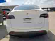 2022 Tesla Model Y Performance with VIN 7SAYGDEF6NF536532, listed as a Copart auction lot 80821345 with 56,233 mi miles and Salvage title. Bid and sale history available at DreamBid. Image 6.