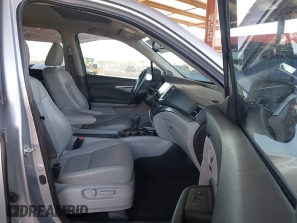 2018 Honda Pilot EX-L with VIN 5FNYF5H55JB031875, listed as a IAAI auction lot 43145763 with 99,165 mi miles and . Bid and sale history available at DreamBid. Image 5.