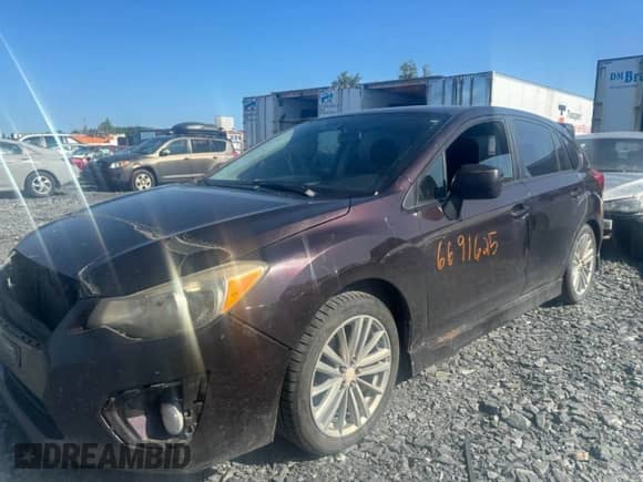 2012 Subaru Impreza Premium z VIN JF1GPAD61CG205990, wystawiony jako Copart lot #66916215 z przebiegiem Nie podano mil oraz Szkoda całkowita • Salvage title. Historia ofert i sprzedaży dostępna na DreamBid. Obrazek 1.