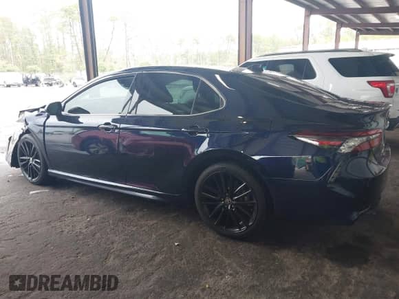 2021 Toyota Camry XSE with VIN 4T1K61AK8MU543474, listed as a IAAI auction lot 43400672 with 63,171 mi miles and . Bid and sale history available at DreamBid. Image 14.