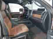 2020 Ram 1500 Longhorn with VIN 1C6SRFKT1LN275397, listed as a IAAI auction lot 42733634 with 101,019 mi miles and . Bid and sale history available at DreamBid. Image 5.