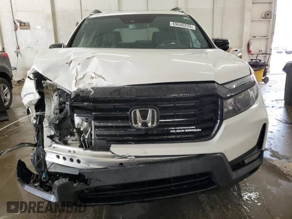 2025 Honda Passport Black Edition с VIN 5FNYF8H80SB005312, выставлен на аукционе Copart как лот 69646235 с пробегом 4 277 миль миль и Списание • Salvage title. История ставок и продаж доступна на DreamBid. Изображение 5.