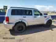 2007 Dodge Nitro SLT with VIN 1D8GU58K67W639577, listed as a Copart auction lot 68736095 with 175,807 mi miles and Salvage title. Bid and sale history available at DreamBid. Image 3.