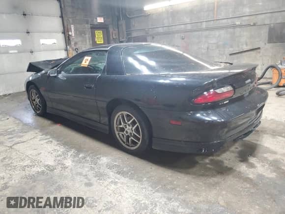 1994 Chevrolet Camaro Z28 z VIN 2G1FP22P2R2173826, wystawiony jako Copart lot #83315694 z przebiegiem 84 732 mil mil oraz Szkoda całkowita • Salvage title. Historia ofert i sprzedaży dostępna na DreamBid. Obrazek 2.