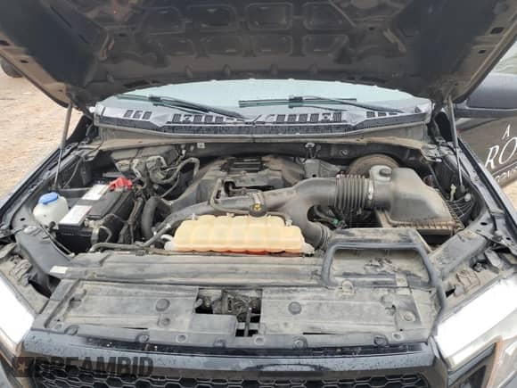 2018 Ford F-150 XL z VIN 1FTEW1CPXJKF74081, wystawiony jako Copart lot #70283065 z przebiegiem 92 035 mil mil oraz Szkoda całkowita • Salvage title. Historia ofert i sprzedaży dostępna na DreamBid. Obrazek 11.