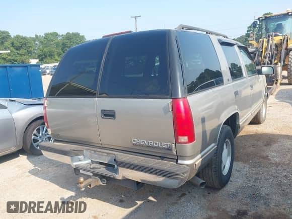 1999 Chevrolet Tahoe with VIN 1GNEC13R6XJ452771, listed as a IAAI auction lot 42922299 with 393,718 mi miles and . Bid and sale history available at DreamBid. Image 4.