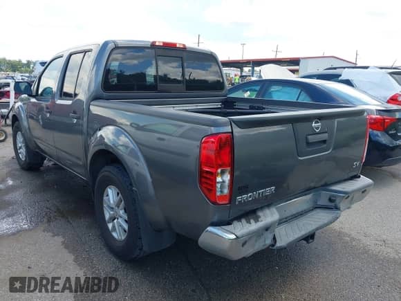 2021 Nissan Frontier SV with VIN 1N6ED0EA4MN703618, listed as a IAAI auction lot 42930673 with 71,638 mi miles and . Bid and sale history available at DreamBid. Image 3.