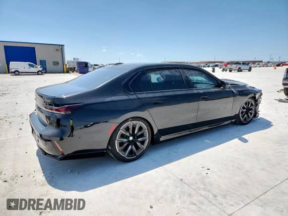 2024 BMW 7 Series 740i xDrive с VIN WBA33EH09RCS88132, выставлен на аукционе Copart как лот 70487665 с пробегом 7 104 миль миль и Списание • Salvage title. История ставок и продаж доступна на DreamBid. Изображение 3.