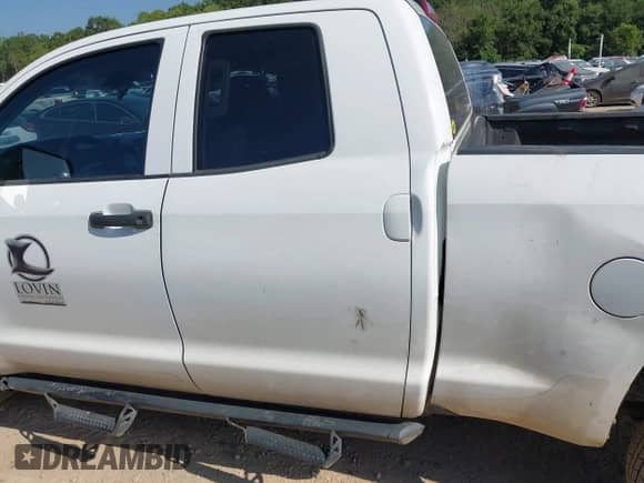 2020 Toyota Tundra SR with VIN 5TFUY5F14LX919793, listed as a IAAI auction lot 42782094 with 164,781 mi miles and . Bid and sale history available at DreamBid. Image 14.