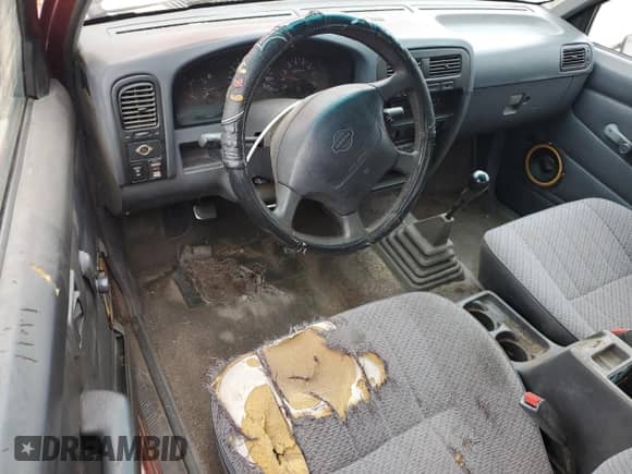 1997 Nissan Frontier XE with VIN 1N6SD16S0VC343065, listed as a Copart auction lot 64619505 with 261,547 mi miles and Clean title. Bid and sale history available at DreamBid. Image 8.