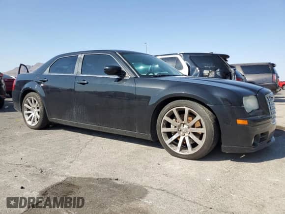 2006 Chrysler 300 C SRT-8 с VIN 2C3LA73W56H102728, выставлен на аукционе Copart как лот 63040605 с пробегом 145 411 миль миль и Чистый • Clean title. История ставок и продаж доступна на DreamBid. Изображение 4.