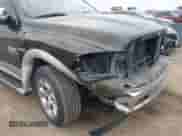 2013 Ram 1500 Laramie with VIN 1C6RR6NT5DS697668, listed as a IAAI auction lot 41501112 with 146,001 mi miles and . Bid and sale history available at DreamBid. Image 6.