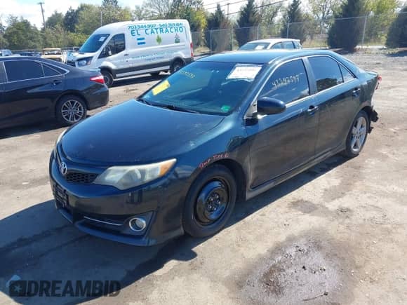 2014 Toyota Camry SE with VIN 4T1BF1FK3EU377777, listed as a IAAI auction lot 43397597 with 211,826 mi miles and . Bid and sale history available at DreamBid. Image 17.