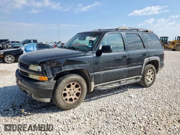 2002 Chevrolet Tahoe Z71 with VIN 1GNEK13Z02R202164, listed as a Copart auction lot 70940025 with 256,198 mi miles and Salvage title. Bid and sale history available at DreamBid. Image 1.