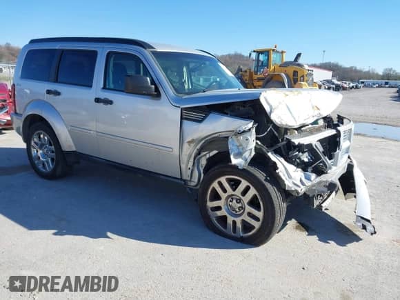 2010 Dodge Nitro Heat with VIN 1D4PU4GK4AW157565, listed as a IAAI auction lot 41851400 with 209,535 mi miles and . Bid and sale history available at DreamBid. Image 1.